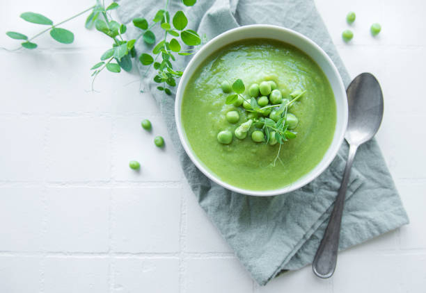 istock Fresh vegetable soup made of green peas 1422959106