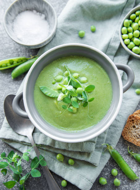 istock Fresh vegetable soup made of green peas 1422959114