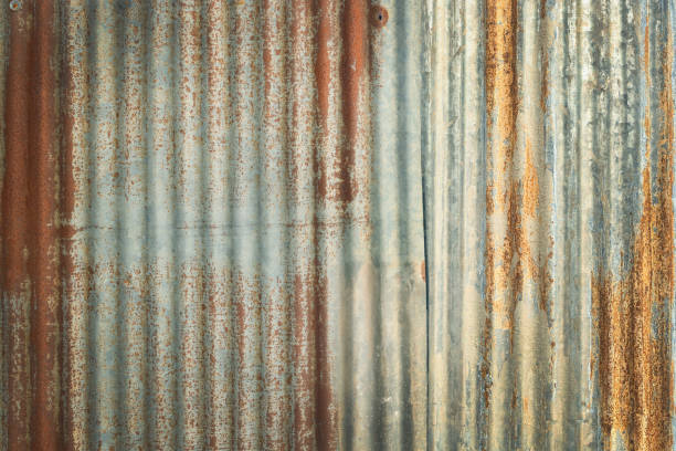 istock Old zinc wall texture background, rusty on galvanized metal panel sheeting. 1422959474