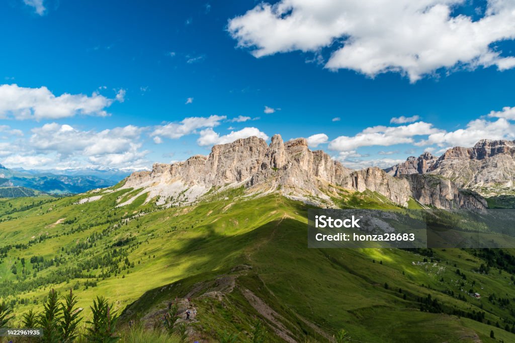 Amazing Dolomites mountains scenery during hiking to Monte Sief mountain peak Zillertal Alps with glaciers snad Setsass mountain peak with meadows bellows from hiking trail to Monte Sief mountain peak in the Dolomites Mountain Stock Photo