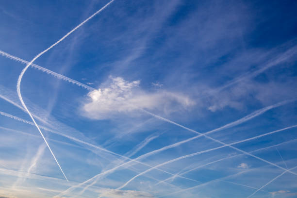istock Contrails or chemtrails in the sky over Germany 1422965972
