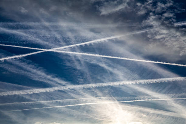 istock Contrails or chemtrails in the sky over Germany 1422966016