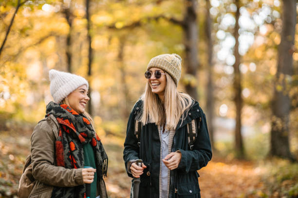 istock Two girlfriends on a hiking tour 1422970065