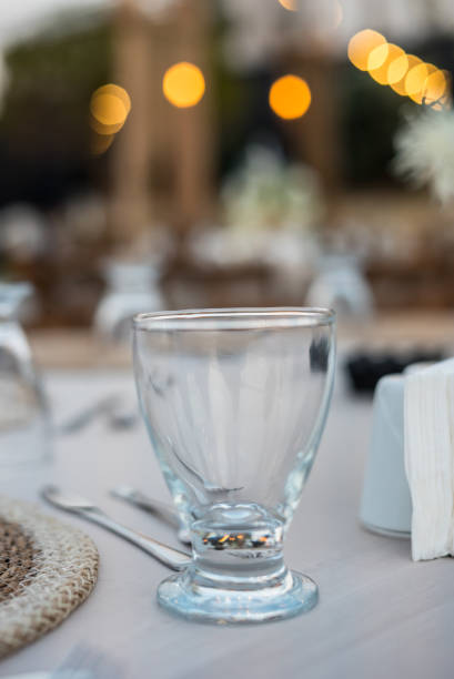 istock empty glass is on the table focus on foreground bookeh is background 1422973164