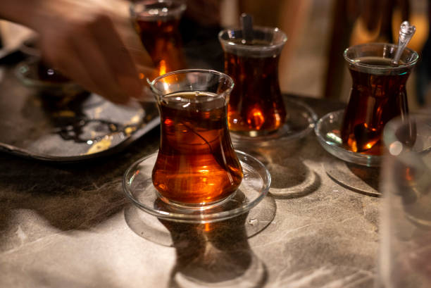 istock tea serving vertical photo focus on foreground at table 1422975955