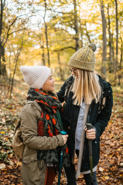 istock Two girlfriends on a hiking tour 1422976877