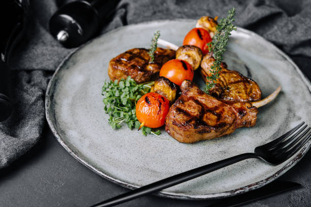 istock Delicious grilled pork chop on plate 1422979132