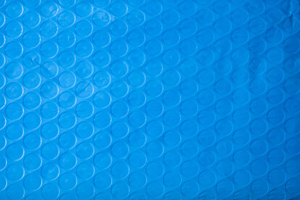 blue plastic wrap air bubble texture background packaging material - bubble foil imagens e fotografias de stock