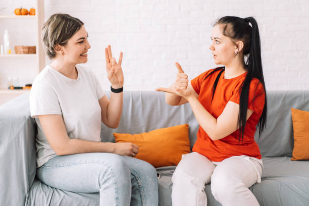 Girl asking for help in sign language stock photo