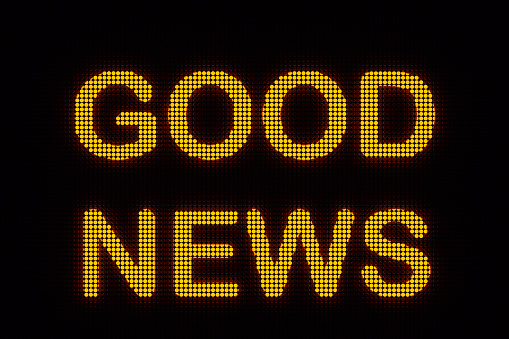 Good News text is illuminated with yellow LED. Motivation, inspiration and business concept. 3D illustration