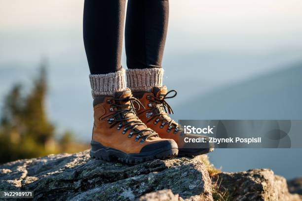 Leather Hiking Boots In Mountain Peak Stock Photo - Download Image Now - Hiking Boot, Boot, Females