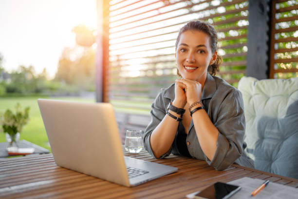 istock woman is working sitting on the patio 1422989865