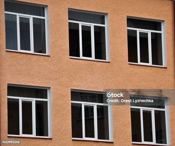 View From The Street On The Metalplastic Windows Stock Photo - Download Image Now - Architecture, Built Structure, Color Image