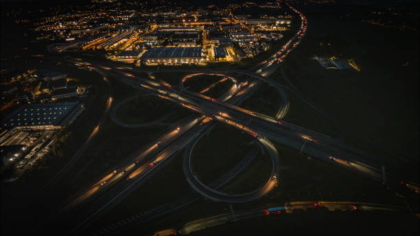 istock Highway Interchange at Night - Aerial View 1422995695
