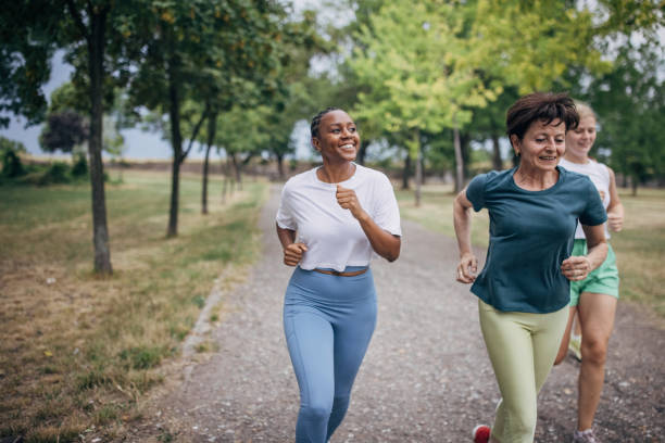 istock Friends jogging together 1422999459