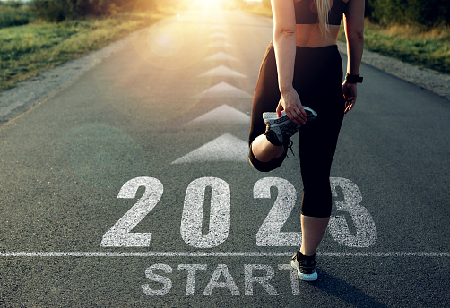 istock Girl waiting to start the new year 2023.Planning,opportunity, challenge and business strategy.Goals, plans and visions  for the next year 2023. New professional achievements in the new years 2023. 1423003141