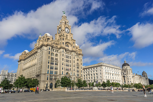 Liverpool, UK- July 9, 2022:Three Graces - The Royal Liver Building, The Cunard Building and the Port of Liverpool Building in Liverpool, England.