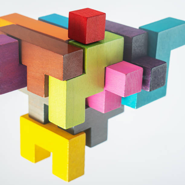 istock Abstract construction from wooden blocks. The concept of logical thinking. 1423011820