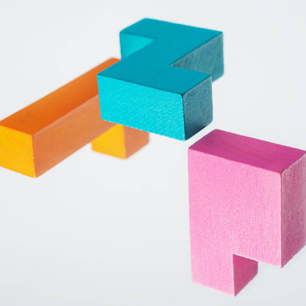 istock Abstract construction from wooden blocks. The concept of logical thinking. 1423011853