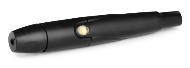 istock Lancet pen on white background. Diabetes control 1423013758