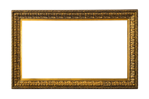 Antique wooden frame for paintings or photographs with gilding, isolated on a white background.