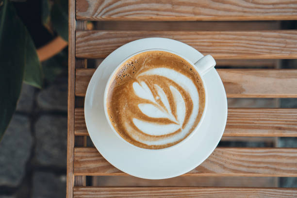 istock Coffee and cake on the table in a coffee shop 1423020688
