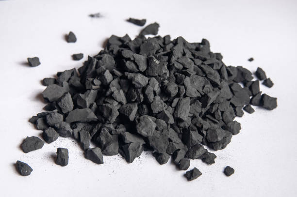 istock Shungite crumbs on a white background 1423022718
