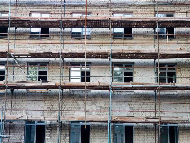 istock Reconstruction of an old brick building 1423028166