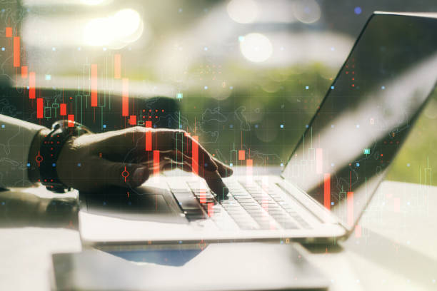 istock Creative abstract economic crisis chart with world map hologram and with hands typing on computer keyboard on background, bankruptcy and recession concept. Multiexposure 1423028596