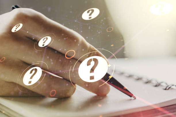 istock Creative abstract question mark sketch and man hand writing in notepad on background, FAQ and research concept. Double exposure 1423028654