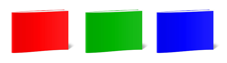 Three RGB Paperback books blank template red, green and blue for presentation layouts and design. 3D rendering. Digitally Generated Image. Isolated on white background.