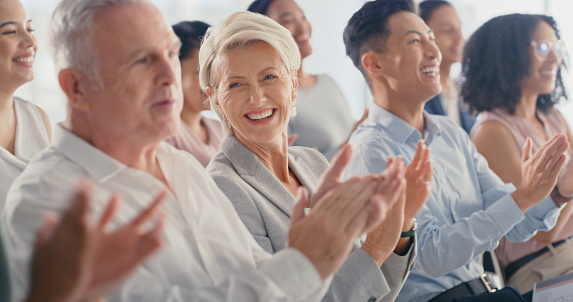 Business audience clapping, at event or seminar with group or people at trade show or workshop. Convention, conference or public speaking or crowd social gesture for approval or admiration at show.