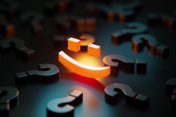 istock Feedback Concept - Yellow Smiley Face Glowing Amid Black Question Marks On Black Background 1423031847