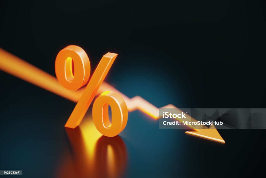 Orange Colored Percentage Sign And Arrow Symbol On Black Background Orange colored percentage sign and arrow symbol sitting on black background. Horizontal composition with copy space. Falling Stock Photo