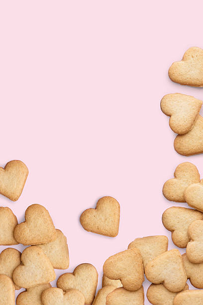 istock Heart-shaped cookies on pink 142303507