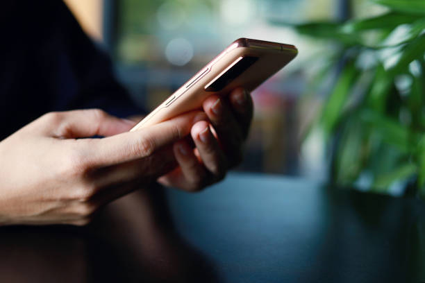 istock Close-up image of a woman using smart phone 1423041346