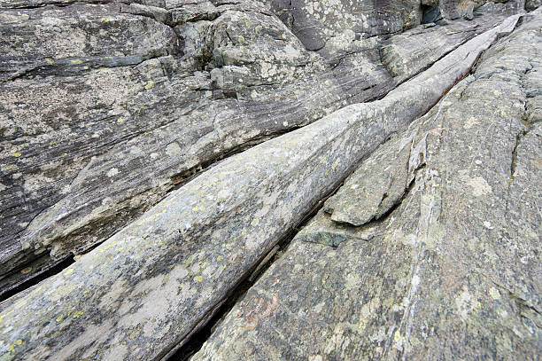 istock Foliated rock formation at Norwegian coastline 142304172