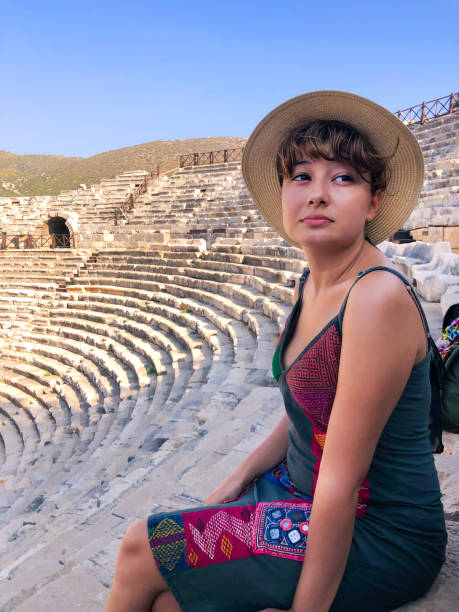 istock A young woman in an ancient theater 1423046001