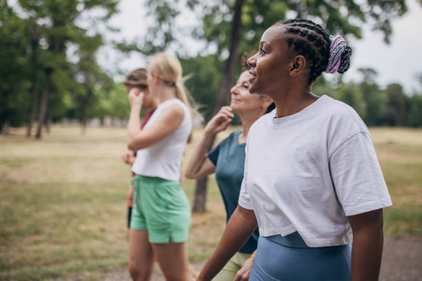 istock Fit women in park together 1423048176