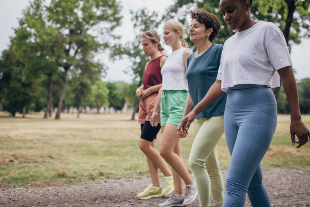 istock Fit women in park together 1423048359