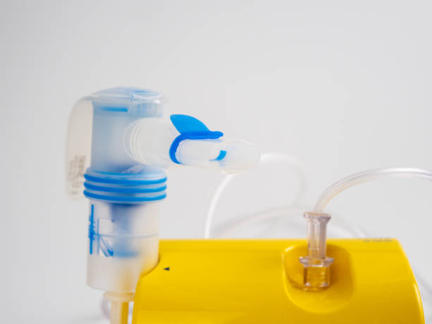 istock Medical equipment for inhalation, nebulizer on a white background. 1423049012