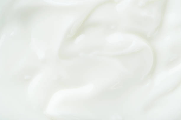 Yogurt. Close up yogurt texture. Backgrounds. Abstract. Concept for packaging design. Mock up. stock photo
