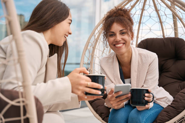 istock Two business ladies enjoying their coffee break 1423054141
