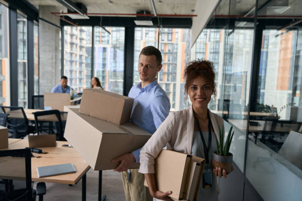 istock Team of company employees getting ready for office move 1423054353