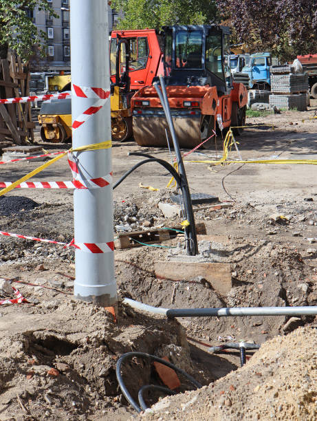 istock Electricity pole under construction on the street 1423062791