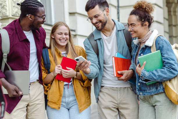 istock Multi-ethnic group of University students hanging out after class 1423062989