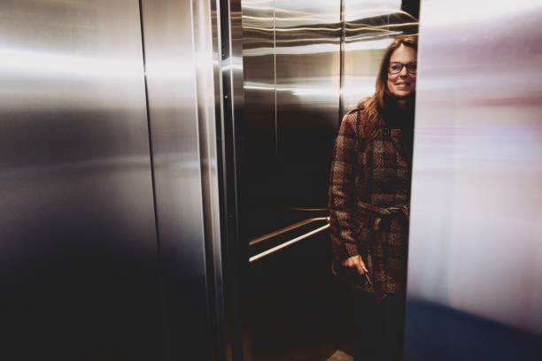 istock Woman in an elavator lift 1423063635
