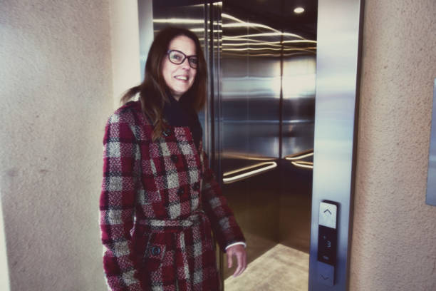 istock Woman in an elavator lift 1423063702