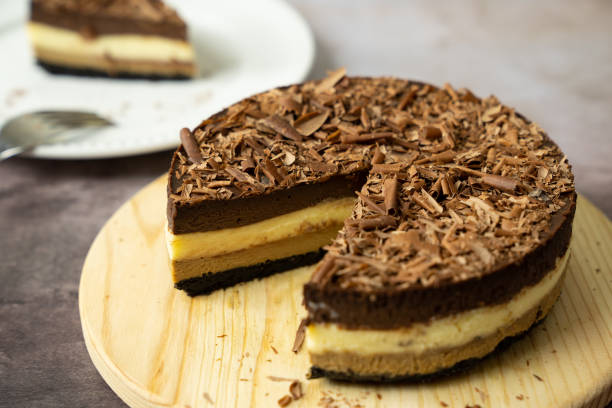 istock Triple chocolate layers baked cheese cake 1423063899