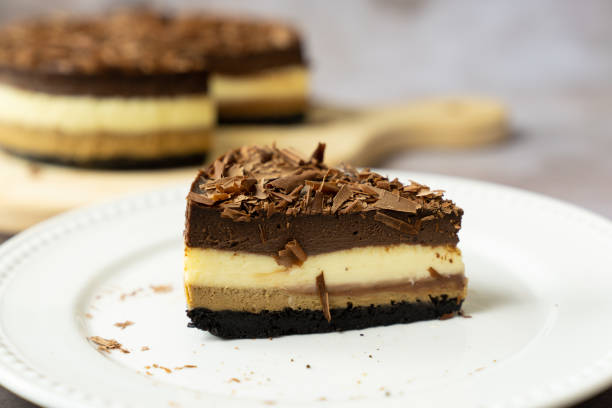 istock Triple chocolate layers baked cheese cake 1423063994